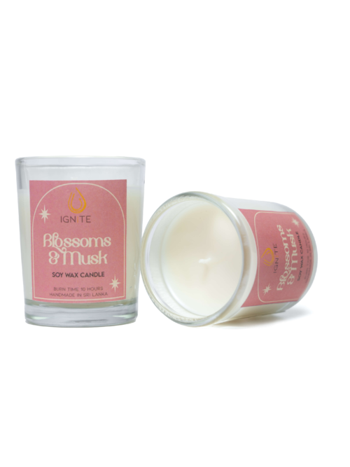 Glass jar containing a soy wax scented candle with a 10-hour burn time