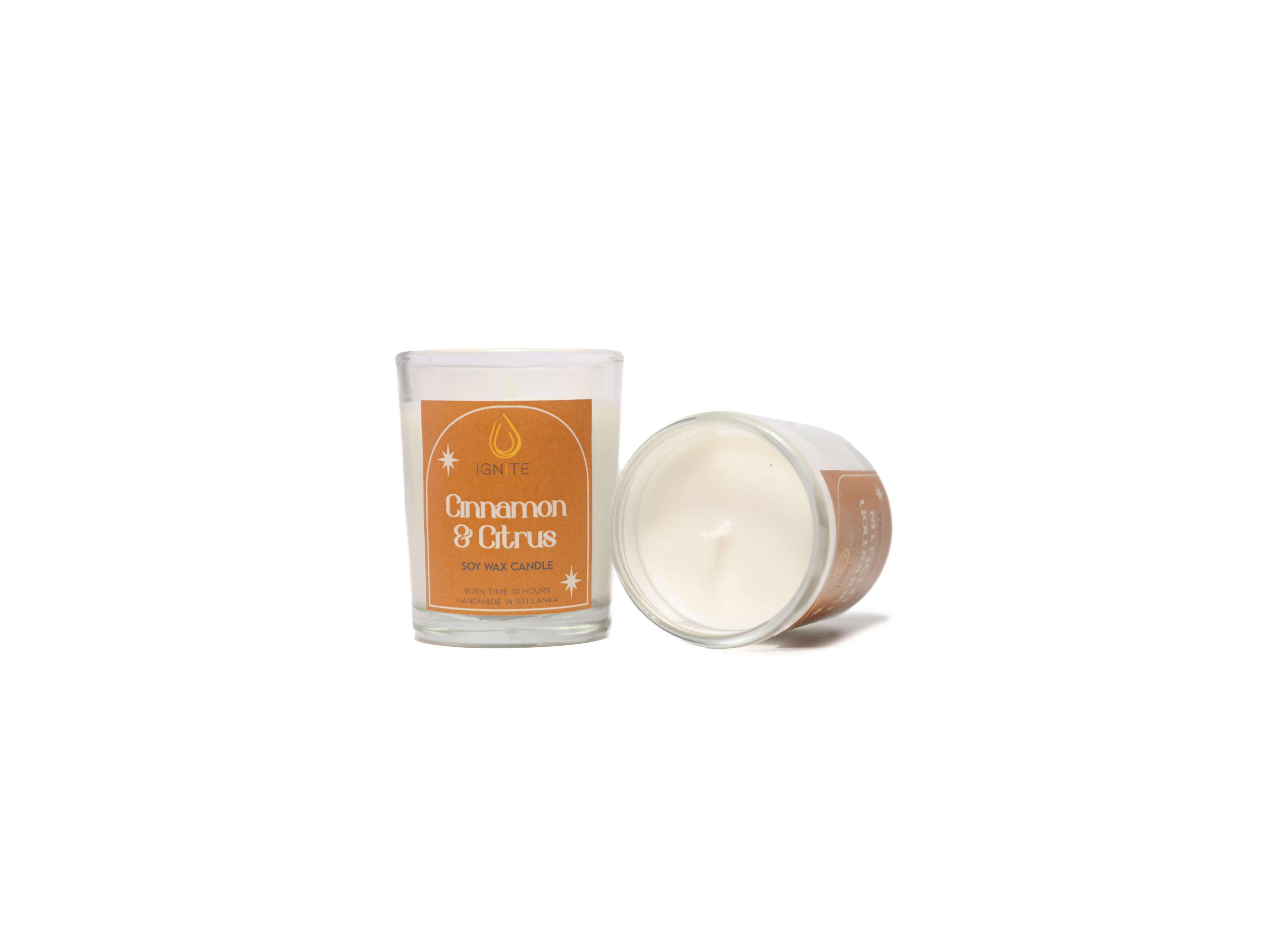 glass-cinnamon-citrus Glass jar containing a soy wax scented candle with a 10-hour burn time