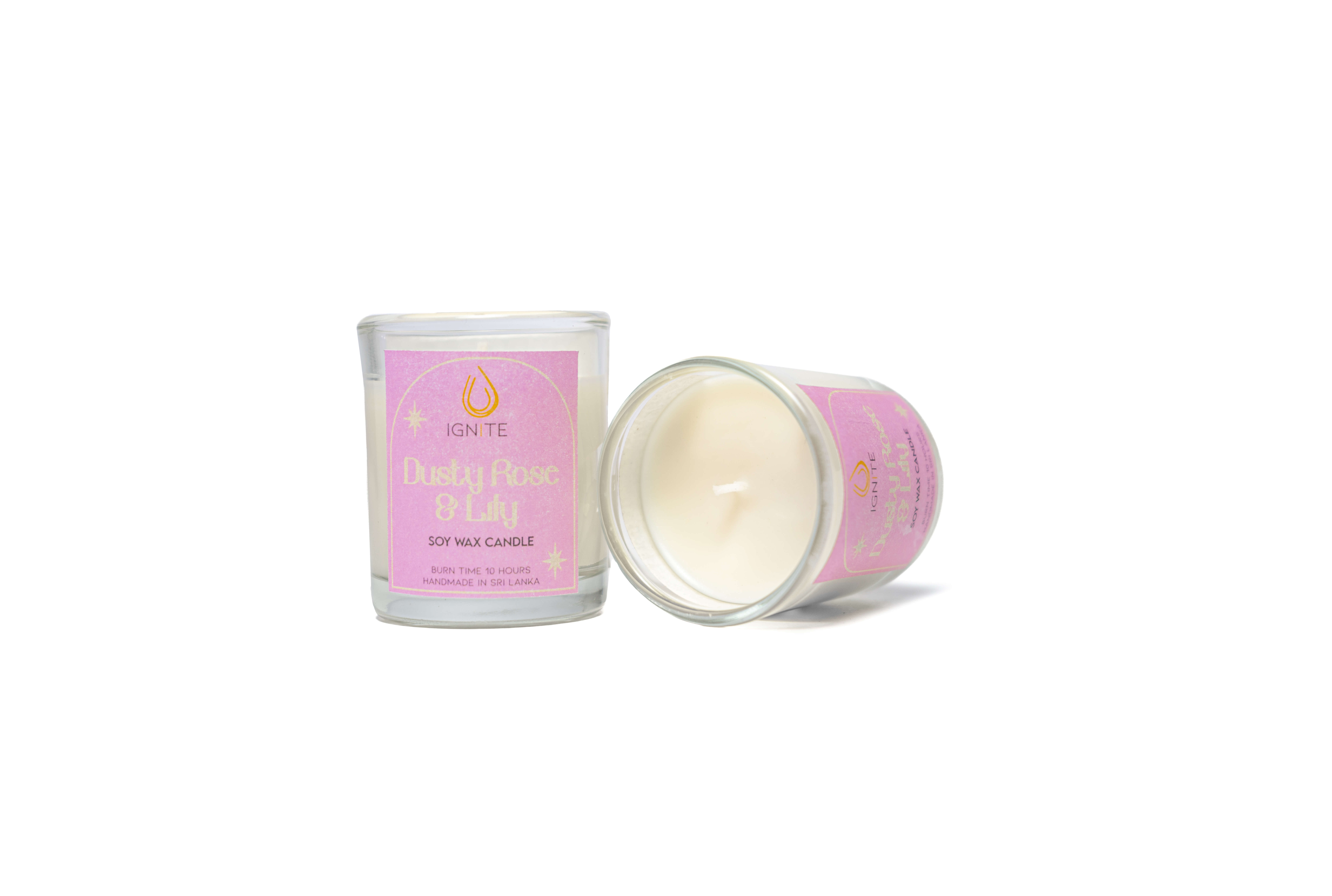 glass-dusty-rose Glass jar containing a soy wax scented candle with a 10-hour burn time