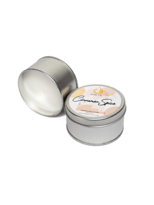 Scented travel candle in a tin with cinnamon spice