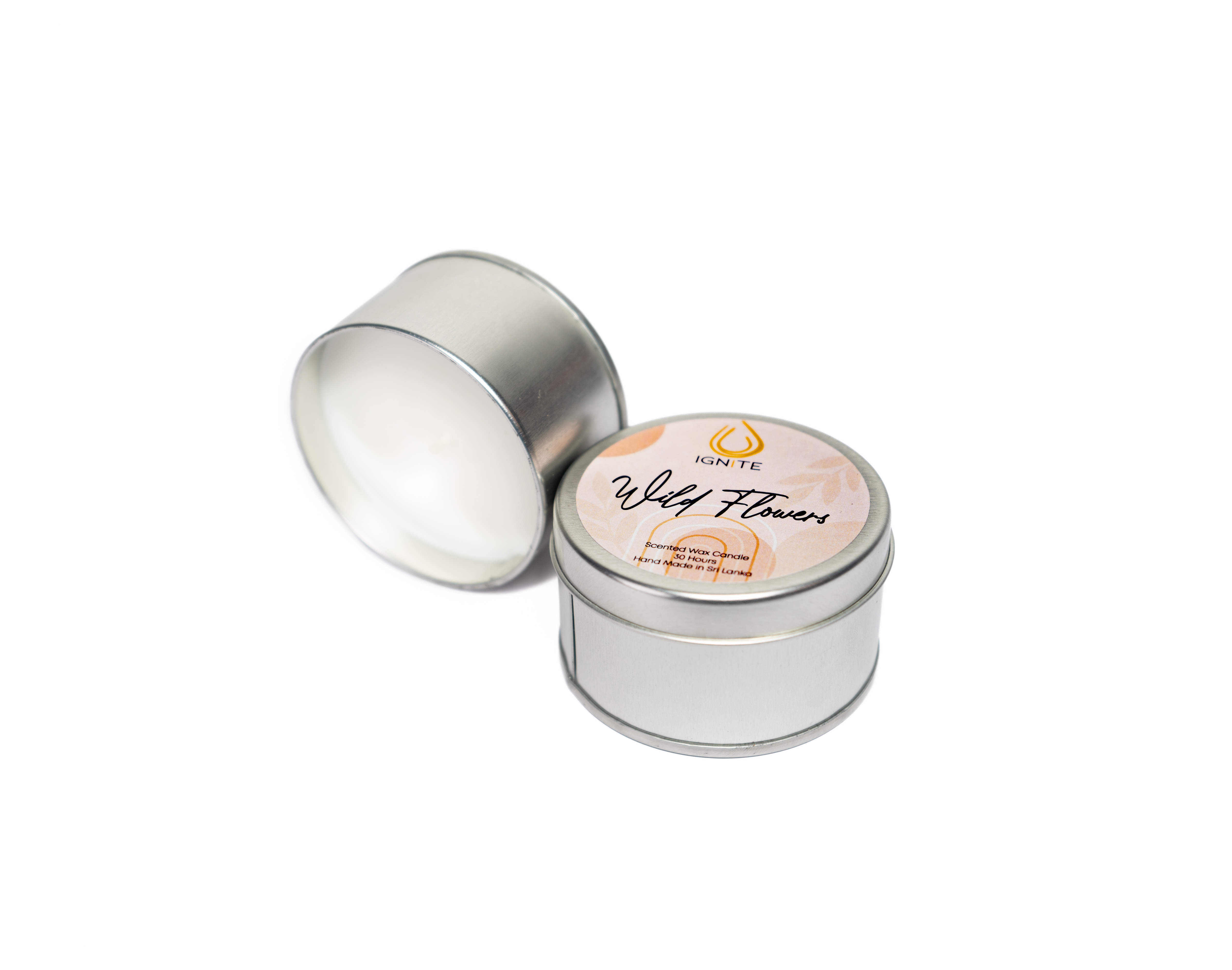 tin-wild-flowers Scented travel candle in a tin with vanilla skies
